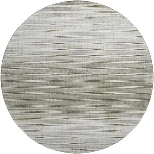 Photo of 8' Taupe And Beige Abstract Washable Round Rug With UV Protection