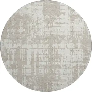 Photo of 8' Taupe And Beige Abstract Washable Round Rug With UV Protection