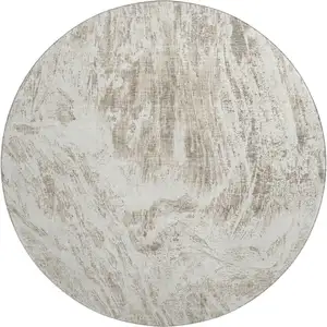 Photo of 8' Taupe And Beige Abstract Washable Round Rug With UV Protection