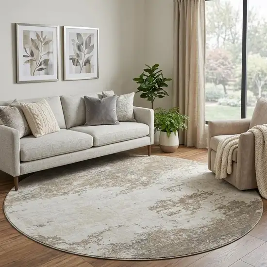 8' Taupe And Beige Abstract Washable Round Rug With UV Protection Photo 1