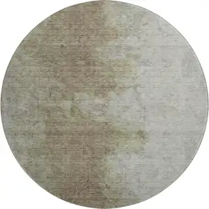 Photo of 8' Taupe And Beige Abstract Washable Round Rug With UV Protection