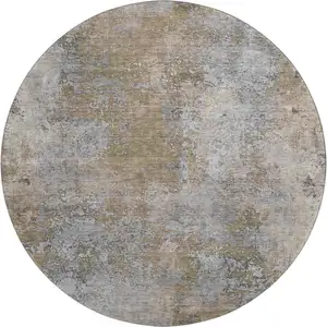 Photo of 8' Taupe And Beige Abstract Washable Round Rug With UV Protection
