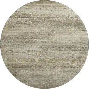 Photo of 8' Taupe And Beige Abstract Washable Round Rug With UV Protection