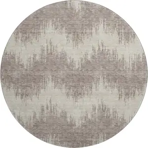 Photo of 8' Taupe And Beige Chevron Washable Round Rug With UV Protection