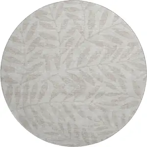 Photo of 8' Taupe And Beige Floral Washable Round Rug With UV Protection