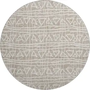 Photo of 8' Taupe And Beige Geometric Washable Round Rug With UV Protection