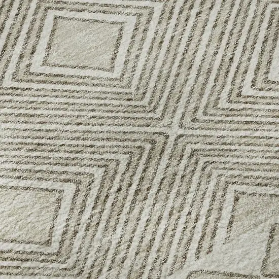 8' Taupe And Beige Geometric Washable Round Rug With UV Protection Photo 9