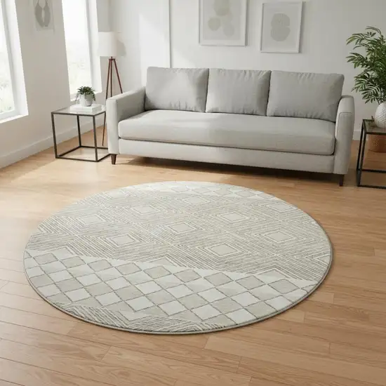 8' Taupe And Beige Geometric Washable Round Rug With UV Protection Photo 2