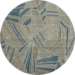 Photo of 8' Taupe And Beige Geometric Washable Round Rug With UV Protection