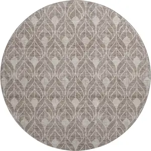 Photo of 8' Taupe And Beige Geometric Washable Round Rug With UV Protection