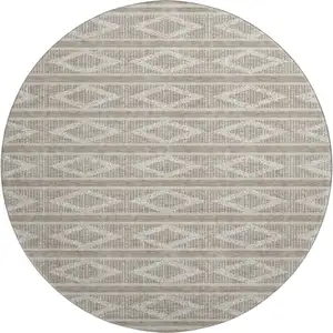 Photo of 8' Taupe And Beige Geometric Washable Round Rug With UV Protection