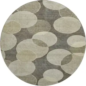 Photo of 8' Taupe And Beige Geometric Washable Round Rug With UV Protection