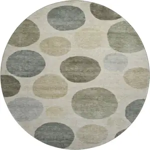 Photo of 8' Taupe And Beige Geometric Washable Round Rug With UV Protection
