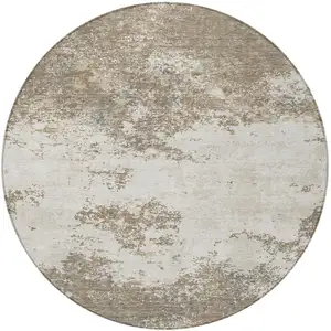 Photo of 8' Taupe And Beige Round Abstract Washable Indoor Outdoor Area Rug