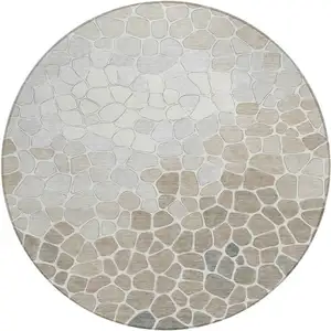 Photo of 8' Taupe And Beige Round Geometric Washable Indoor Outdoor Area Rug