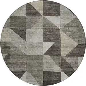 Photo of 8' Taupe And Beige Round Geometric Washable Indoor Outdoor Area Rug