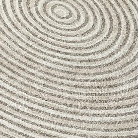 8' Taupe And Beige Round Geometric Washable Indoor Outdoor Area Rug Photo 8