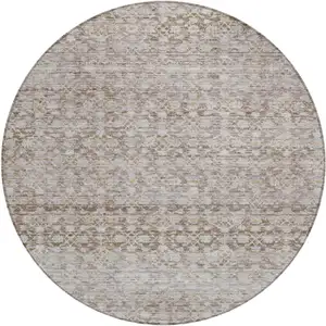 Photo of 8' Taupe And Beige Round Striped Washable Indoor Outdoor Area Rug