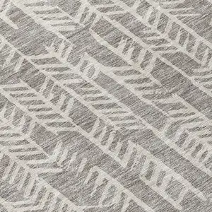 Photo of 8' Taupe And Beige Round Tribal Washable Indoor Outdoor Area Rug