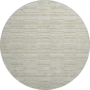 Photo of 8' Taupe And Beige Striped Washable Round Rug With UV Protection