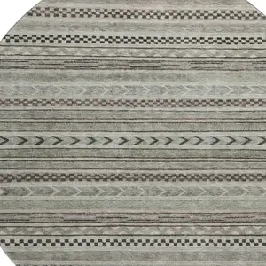 Photo of 8' Taupe And Beige Striped Washable Round Rug With UV Protection