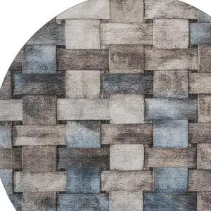 Photo of 8' Taupe And Blue Striped Washable Round Rug With UV Protection