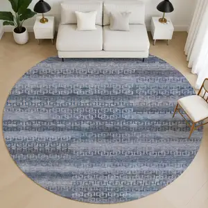 Photo of 8' Taupe And Blue Striped Washable Round Rug With UV Protection