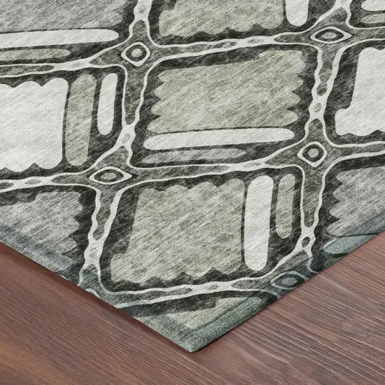 8' Taupe And Brown Round Geometric Washable Indoor Outdoor Area Rug Photo 3