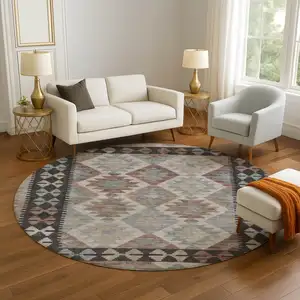 Photo of 8' Taupe And Charcoal Tribal Washable Round Rug With UV Protection