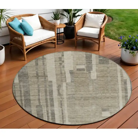 8' Taupe And Dark Gray Round Striped Washable Indoor Outdoor Area Rug Photo 1