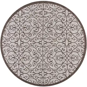Photo of 8' Taupe And Espresso Round Geometric Indoor Outdoor Area Rug