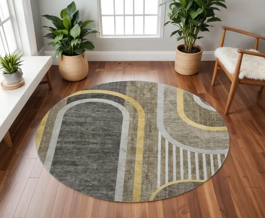 8' Taupe And Gold Geometric Washable Round Rug With UV Protection Photo 2