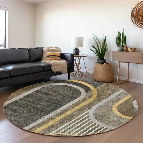 8' Taupe And Gold Geometric Washable Round Rug With UV Protection Photo 5