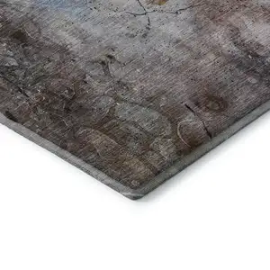 Photo of 8' Taupe And Gray Abstract Washable Round Rug With UV Protection