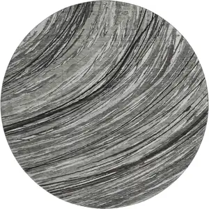 Photo of 8' Taupe And Gray Abstract Washable Round Rug With UV Protection