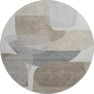 Photo of 8' Taupe And Gray Abstract Washable Round Rug With UV Protection