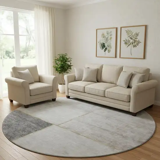 8' Taupe And Gray Geometric Washable Round Rug With UV Protection Photo 1