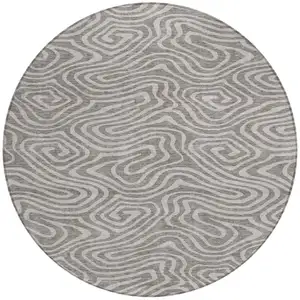 Photo of 8' Taupe And Gray Round Abstract Washable Indoor Outdoor Area Rug
