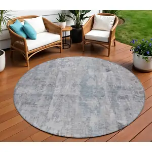 Photo of 8' Taupe And Gray Round Abstract Washable Indoor Outdoor Area Rug