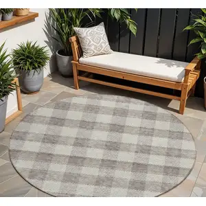 Photo of 8' Taupe And Gray Round Plaid Washable Indoor Outdoor Area Rug