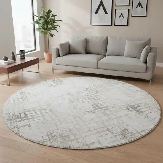 8' Taupe And Ivory Abstract Geometric Washable Round Rug With UV Protection Photo 2