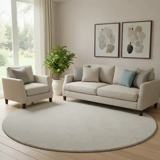 8' Taupe And Ivory Abstract Geometric Washable Round Rug With UV Protection Photo 1