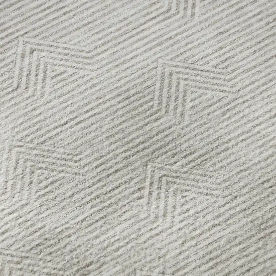 8' Taupe And Ivory Abstract Geometric Washable Round Rug With UV Protection Photo 9