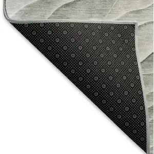 Photo of 8' Taupe And Ivory Abstract Washable Area Rug With UV Protection