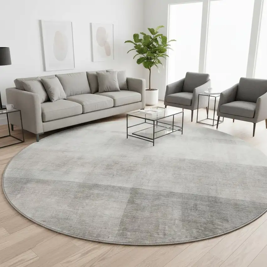 8' Taupe And Ivory Abstract Washable Round Rug With UV Protection Photo 2