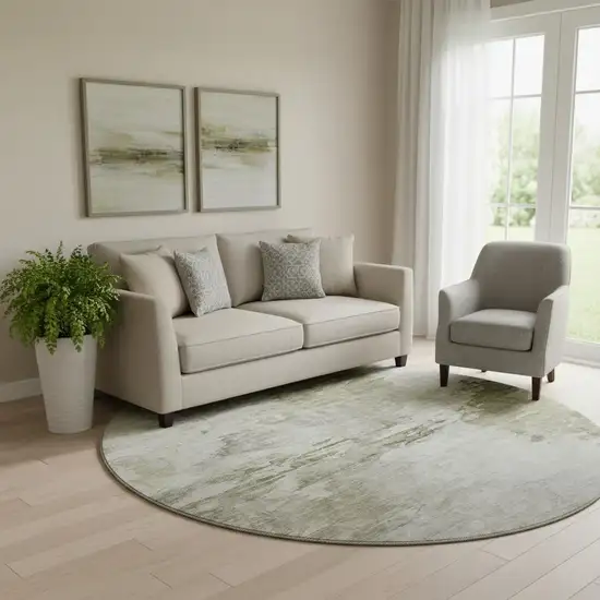 8' Taupe And Ivory Abstract Washable Round Rug With UV Protection Photo 1