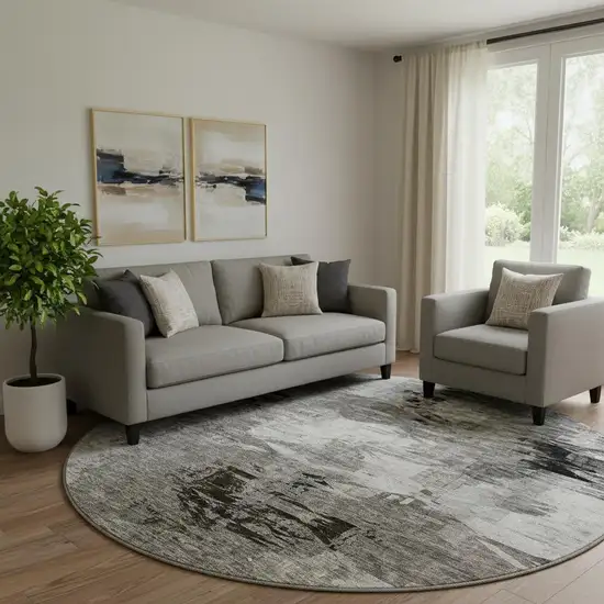 8' Taupe And Ivory Abstract Washable Round Rug With UV Protection Photo 1