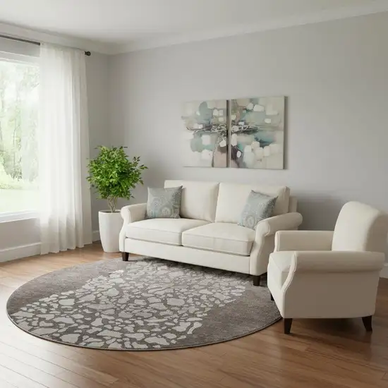 8' Taupe And Ivory Abstract Washable Round Rug With UV Protection Photo 1