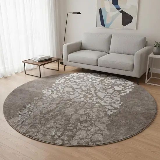 8' Taupe And Ivory Abstract Washable Round Rug With UV Protection Photo 2