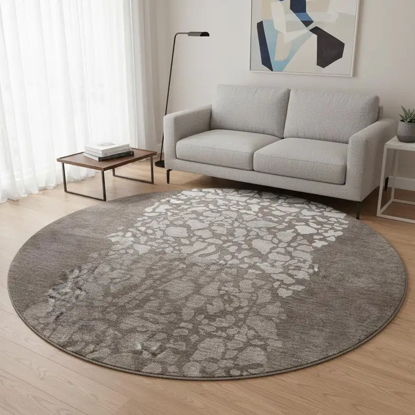 8' Taupe And Ivory Abstract Washable Round Rug With UV Protection Photo 2